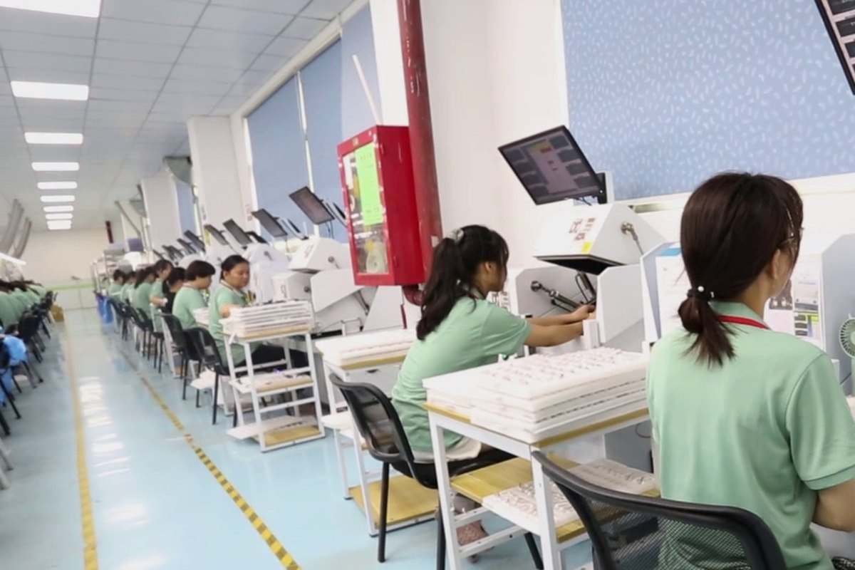 Testing and quality control stations at an electronics factory